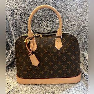 Brown logo luxury inspired bag